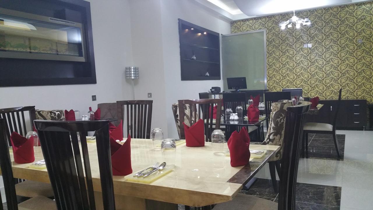 H210 Hotel Aliayabiagba Bagian luar foto