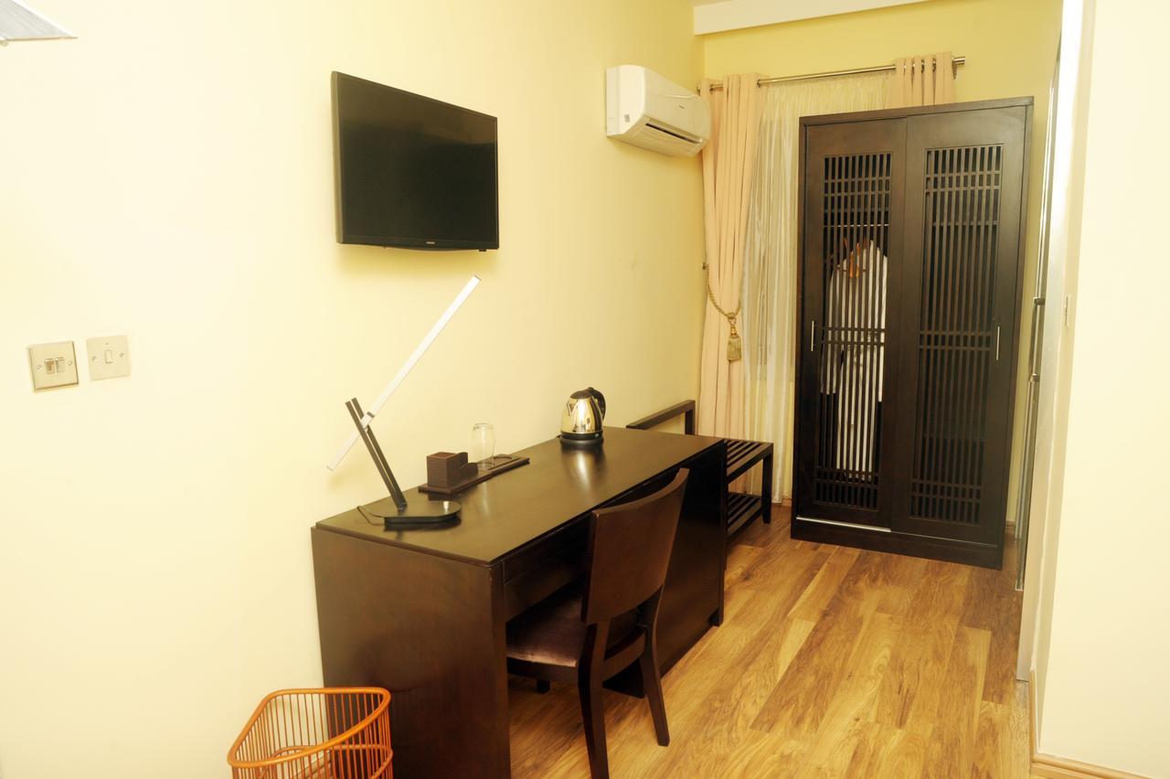 H210 Hotel Aliayabiagba Bagian luar foto